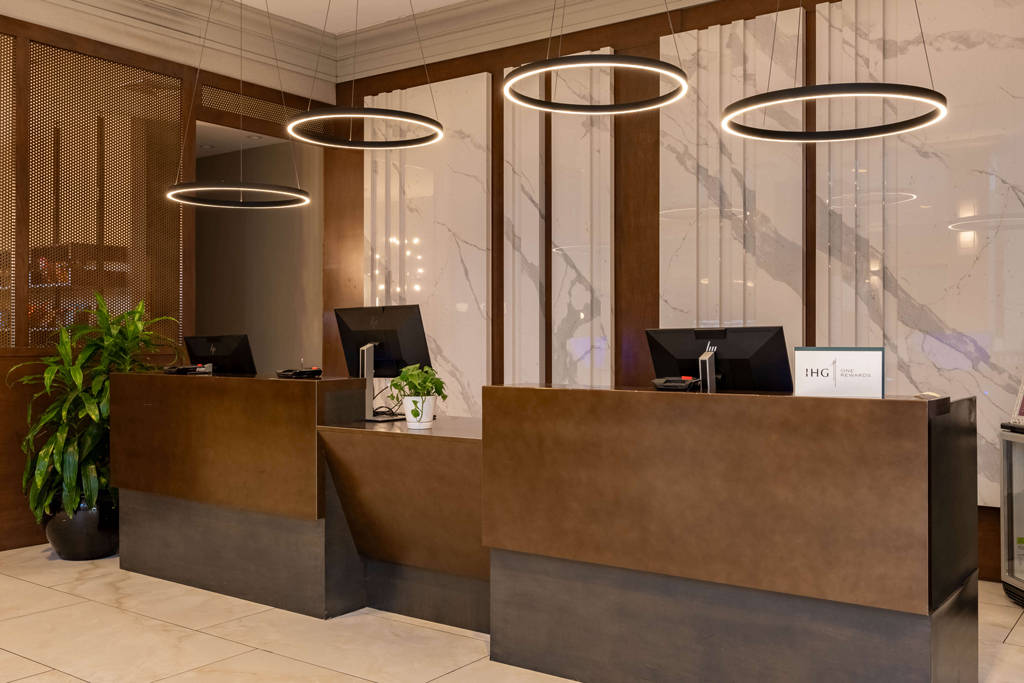 Hotel front desk with modern lighting